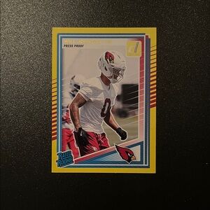 Panini Trading Card with Yellow and Red Accents